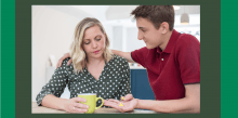 teenage carer giving pills to mother